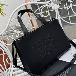Protect Black Women large handbag in Black.